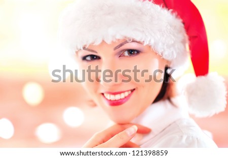 cute woman in red cap on a white