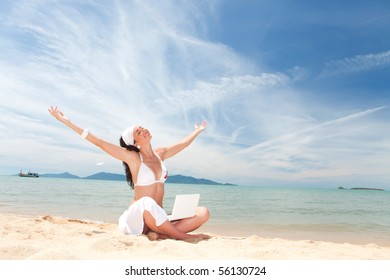 Cute Woman With White Laptop On The Summer Beach