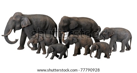 The cute wooden elephants and their calf