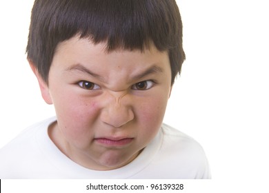 Cute Young Asian Boy With An Angry Face Isolated On White Background