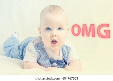 Cute, Young Baby Shocked, With Eyes And Mouth Wide Open Next To Inscription 'OMG', Toned