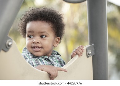 Cute Young Child In A Playground