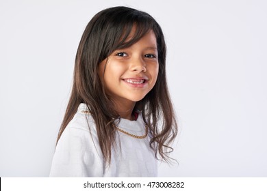 Cute Young Child Portrait In Studio Isolated On White Background