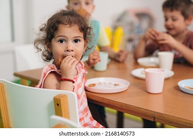 Cute Young Girl Breakfast In Kindergarden