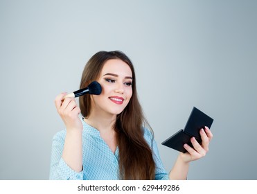 Cute, Young Girl Doing Makeup