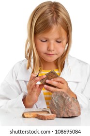 Cute Young Girl Doing Science Experiment