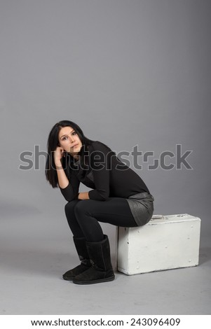 Similar – Woman at the window of a parking garage