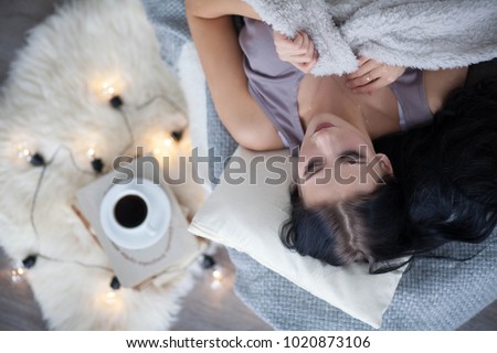 cute young girl sleeping in bed