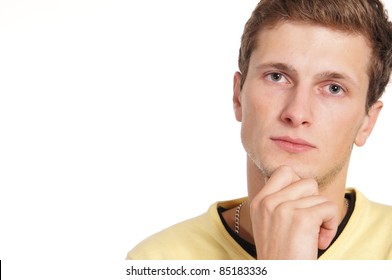 cute young man posing on a white