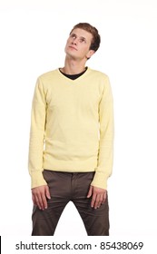 cute young man posing on a white