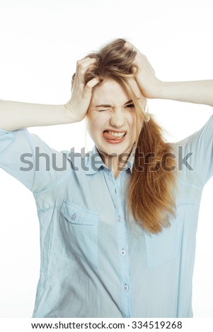 cute young pretty girl thinking on white background isolated close up, crazy emotional goofy fooling around