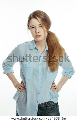 cute young pretty girl thinking on white background isolated close up, crazy emotional goofy fooling around teenage
