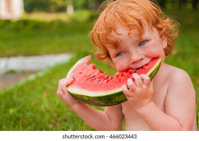 Cute Young Red Haired Girl Eating Watermelon. Happy Family Enjoying Healthy Fruit. Toddler Girl