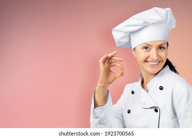 Cute Young Woman Cook Posing In White Uniform