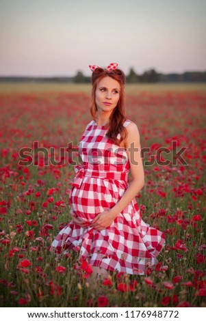 cute young woman waiting a baby