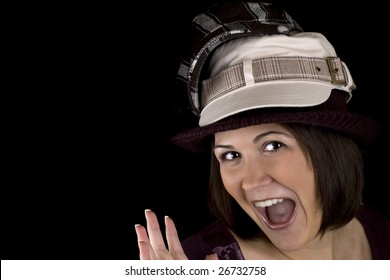 Cute Young Woman Wearing Too Many Hats.