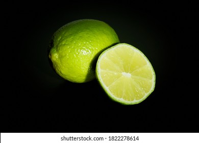                       Cuted lime with dark background.         