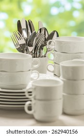 Cutlery And Dishes, Clean And Stacked