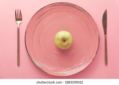 Cutlery And Empty Plate On Wooden Background Top Down