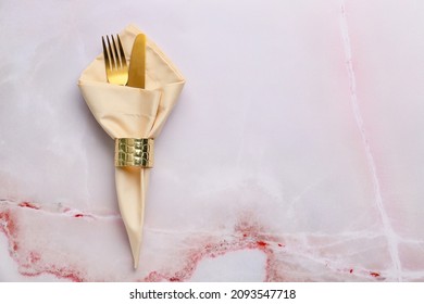 Cutlery And Fabric Napkin On Color Background