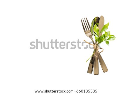 Cutlery on white table background.

