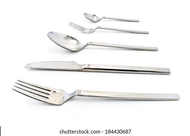 Cutlery Set With Fork, Knife And Spoon Isolated On White