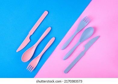 Cutlery Set Made Of Wheat Straw Of Pink And Blue Colors On Geometric Background. Portable Reusable Utensils. School Lunch Concept. Flat Lay