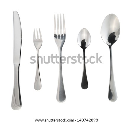Cutlery silverware or flatware set of forks, spoons and knife isolated over white background