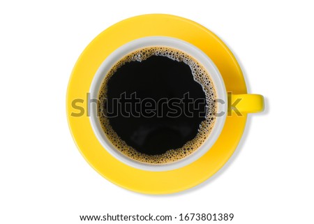 cutout Italian style hot black coffee with heart-shaped froth in the yellow coffee cup isolated on white background top view with clipping path