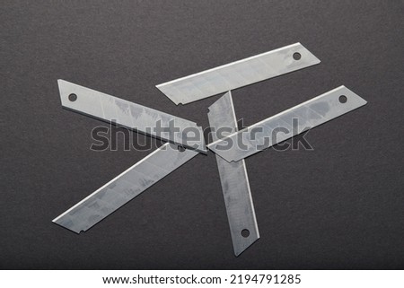 Cutter blades on a black background