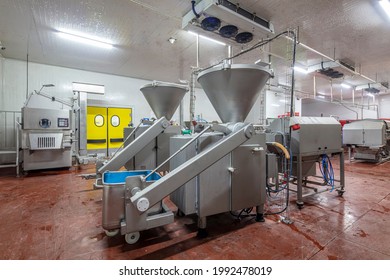 Cutter or Mincer for meat processing in the food industry for meat plant. The meat industry. 