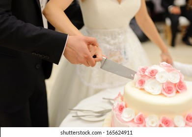 Cutting Beautiful Wedding Cake