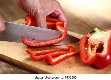 Cutting Bell Pepper. Series - making tortilla with chicken and bell pepper. - Powered by Shutterstock