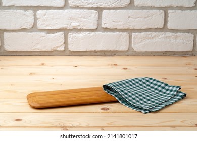 Cutting Board With Cotton Napkin On Wooden Table, Close Up