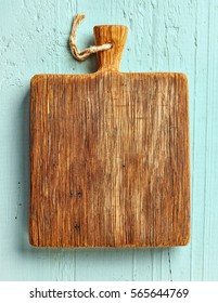 Cutting Board On Blue Wooden Table, Top View