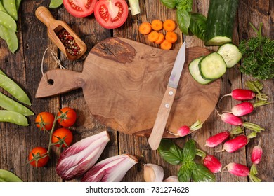 cutting board with raw vegetable