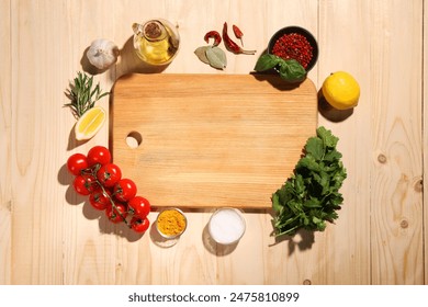 Cutting board surrounded by spices, tomatoes, oil and lemon on wooden table, flat lay. Space for text - Powered by Shutterstock