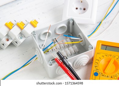 cutting box, digital multimeter, circuit breakers and installation of power supply systems