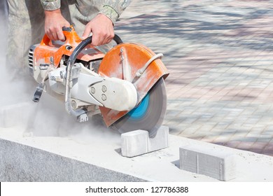 Cutting concrete paving stabs or metal using a cut-off saw