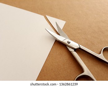 Cutting Corners Idiom Briticism Hand Takes Sheet Of Paper And Cutting Corners Doing Something So Easily And Cheaply As Possible 