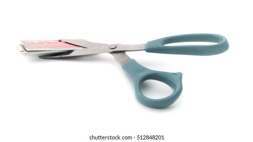 Cutting Credit Card Debt. 
Isolated Scissors With Credit Cards.
