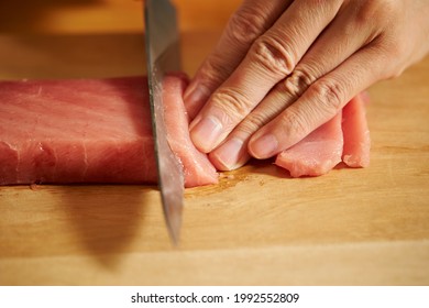 Cutting Fresh Tuna With A Sashimi Knife