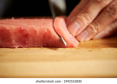 Cutting Fresh Tuna With A Sashimi Knife