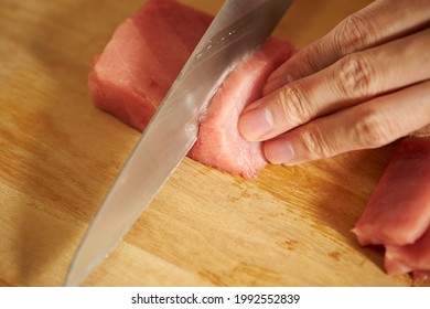 Cutting Fresh Tuna With A Sashimi Knife