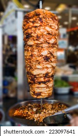 cutting hen Turkish food Doner Kebab in the restaurant