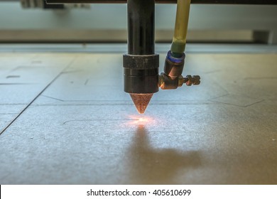 cutting machine carving patterns on the plastic plate