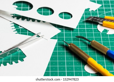 Cutting mat with paper and tools 