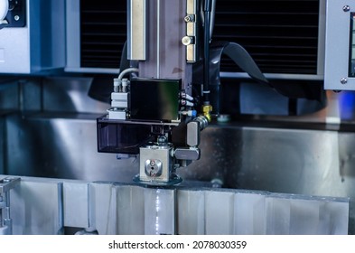 Cutting The Metal Of The EDM Machine