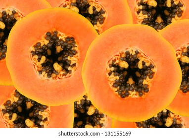 Cutting Papaya Fruit On Background