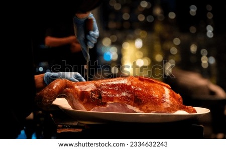 Cutting of Peking Roast Duck,Chinese style dishes that are famous in Thai restaurants.